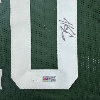 Green Breece Hall Jets jersey with black autograph perfect for your man cave JSA COA