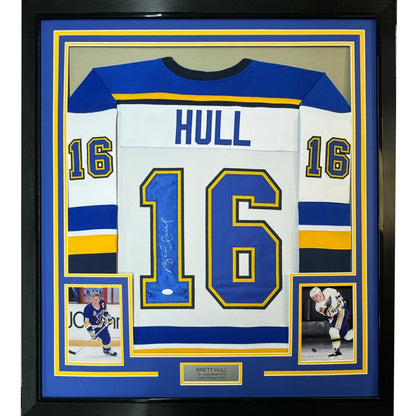 Framed Brett Hull Signed Blues Jersey with Player Photos ready for display