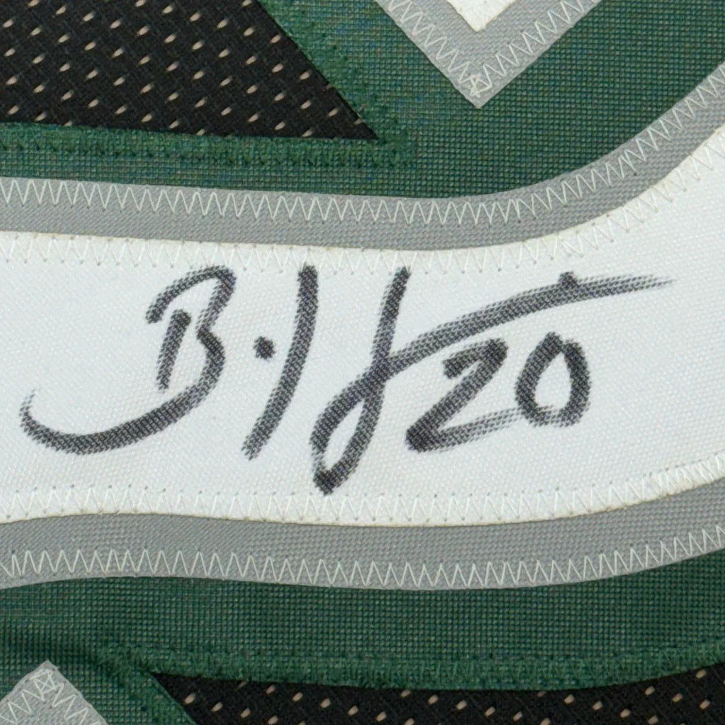 Autographed Green and White Eagles Jersey displayed in Brian Dawkins Signed Jersey masterpiece