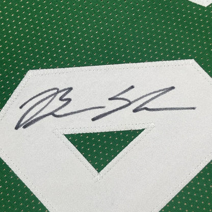Green Celtics jersey with black autograph on white patch in Framed Brian Scalabrine display