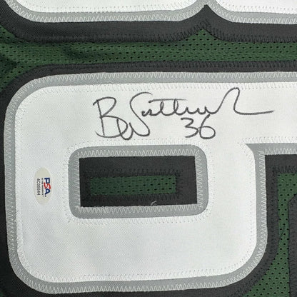 Autographed Brian Westbrook Eagles Jersey with PSA authentication sticker on display