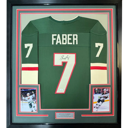 Framed autographed Brock Faber Minnesota Wild green jersey with Faber 7 on back