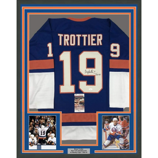 Framed autographed Bryan Trottier HOF 97 blue Islanders jersey, number 19