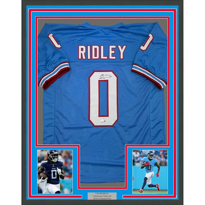 Framed autographed blue Tennessee Titans Calvin Ridley jersey with number 0