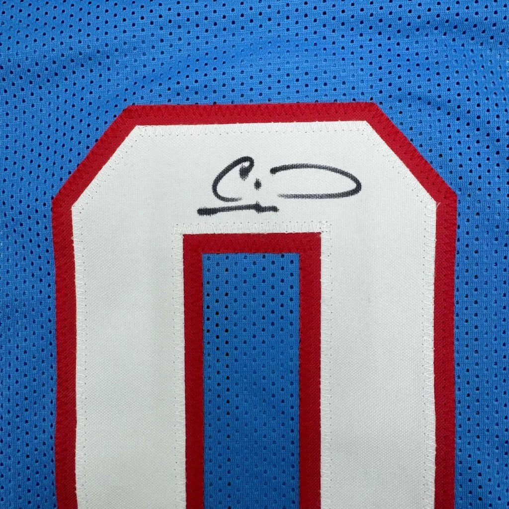 Framed autographed Calvin Ridley Tennessee retro blue football jersey with number 1, Beckett BAS COA