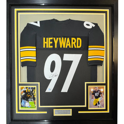 Framed and autographed Cameron Heyward Steelers jersey with photos for display