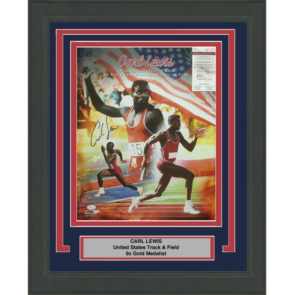 Framed signed Carl Lewis Olympics photo in red white track uniform with number 15