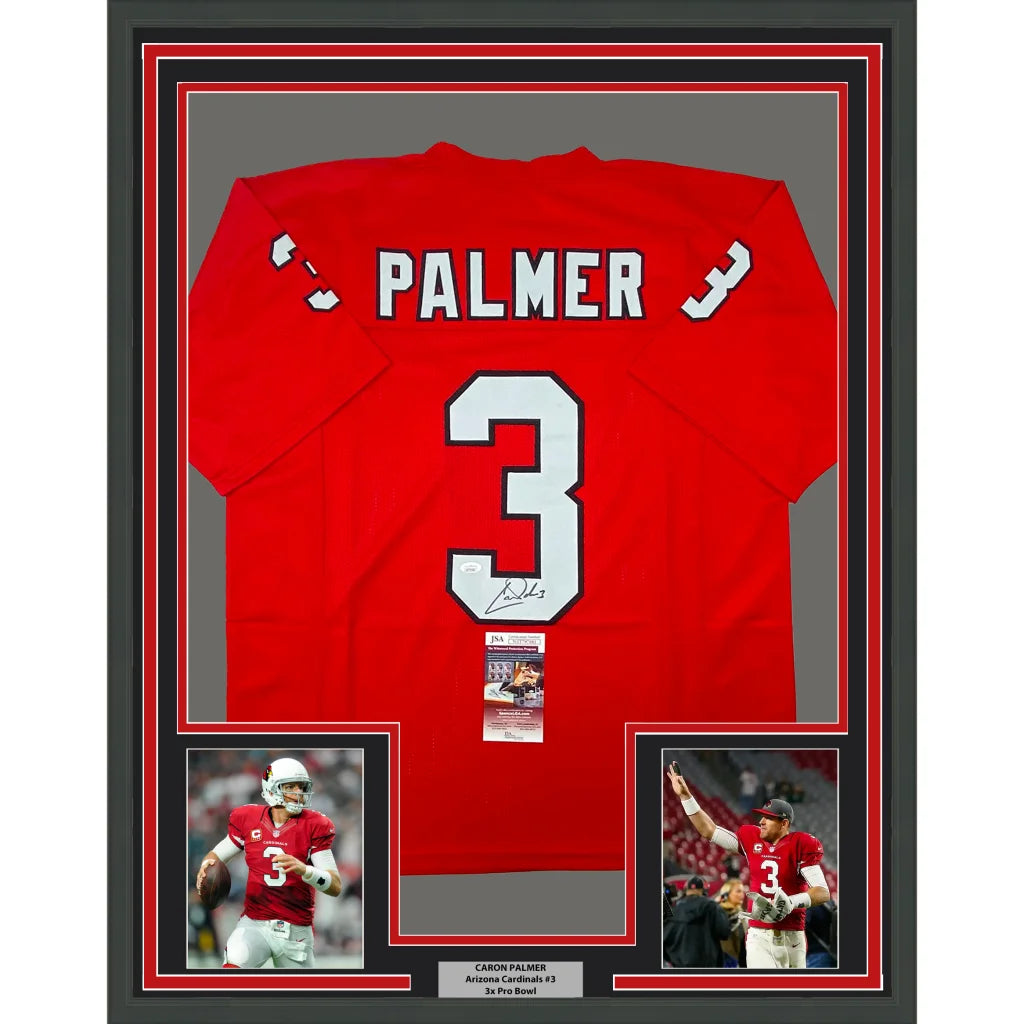 Framed Carson Palmer Arizona Cardinals signed jersey with player photos and authenticity card
