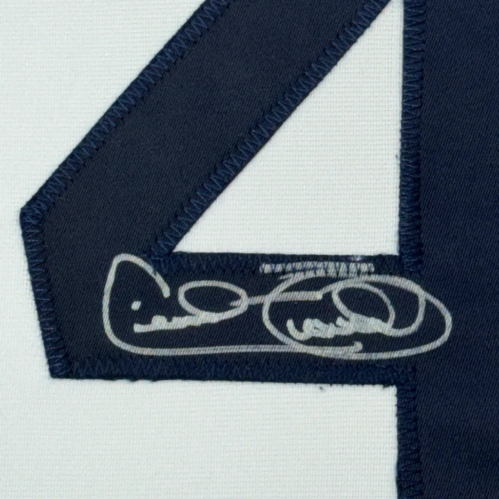 Navy blue Cecil Fielder man cave jersey with silver autograph ready for wall display
