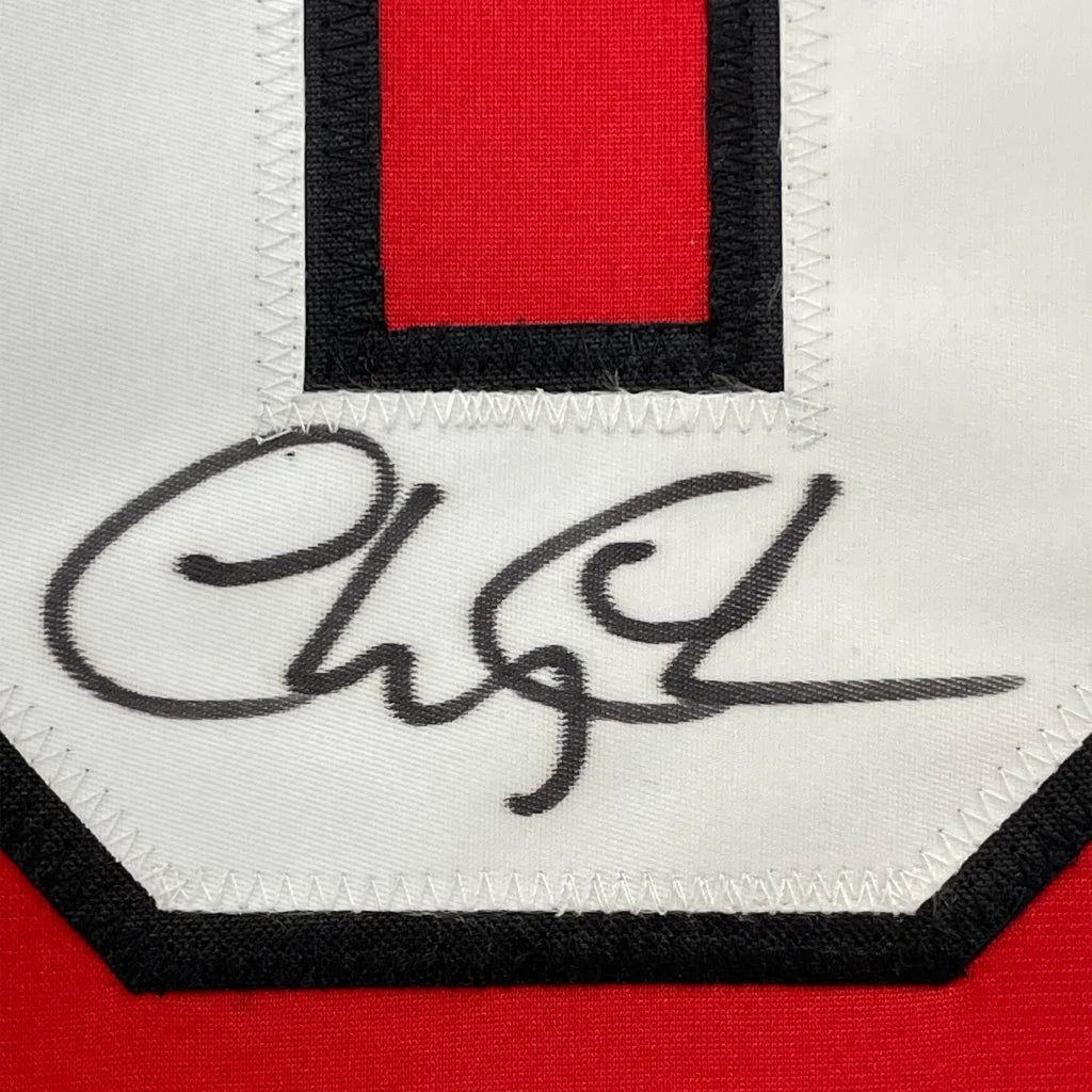 Framed Autographed Chevy Chase Clark Griswold 35x39 Christmas Vacation Movie Chicago Red Hockey Jersey Beckett BAS COA | Certified Authentic Signed Memorabilia | vintageantiquesgifts.com