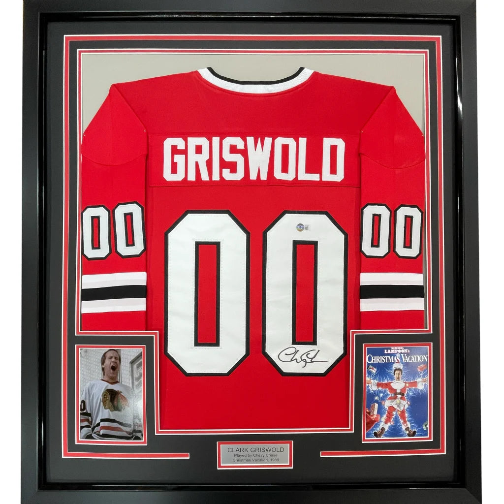 Framed Autographed Chevy Chase Clark Griswold 35x39 Christmas Vacation Movie Chicago Red Hockey Jersey Beckett BAS COA | Hall of Fame Sports Memorabilia | vintageantiquesgifts.com