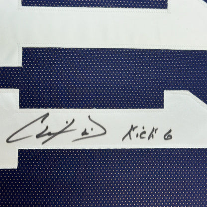 Autographed blue and white Sports Jersey from Championship Ready C Davis Jr display