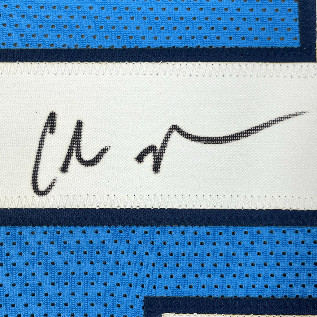 Framed autographed Chris Johnson Tennessee powder blue jersey label with JSA COA