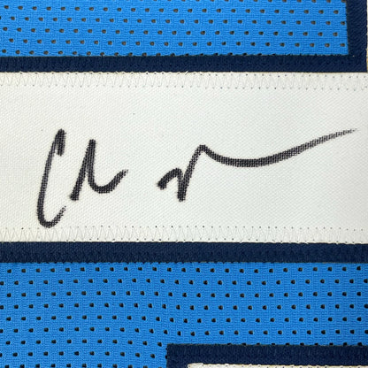 Framed autographed Chris Johnson Tennessee powder blue jersey label with JSA COA