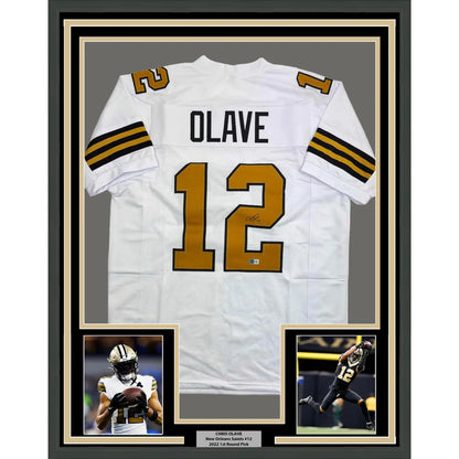 Framed autographed Chris Olave white New Orleans Saints Color Rush jersey back, number 12