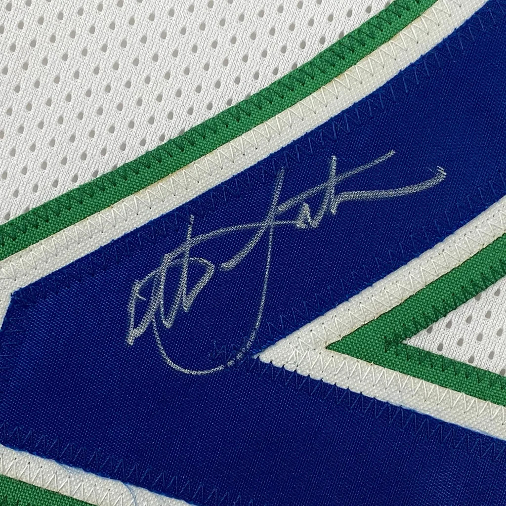 Autographed white blue green Timberwolves jersey ready to hang display Christian Laettner