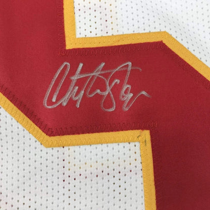 White and red Christian Okoye Chiefs jersey with silver autograph and action photos