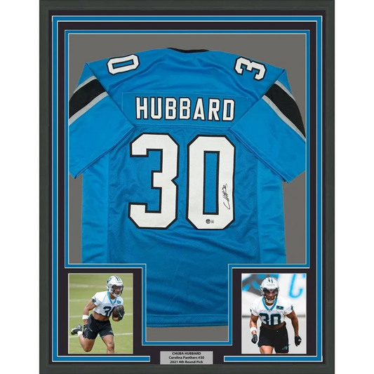 Framed Chuba Hubbard Carolina Blue jersey with autographs and player pics for your man cave