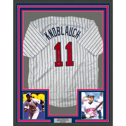 Framed autographed Chuck Knoblauch Minnesota pinstripe jersey with red 11
