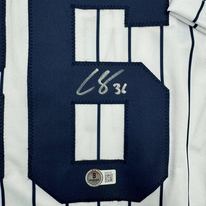 Framed autographed Clarke Schmidt New York Yankees pinstripe jersey number 6