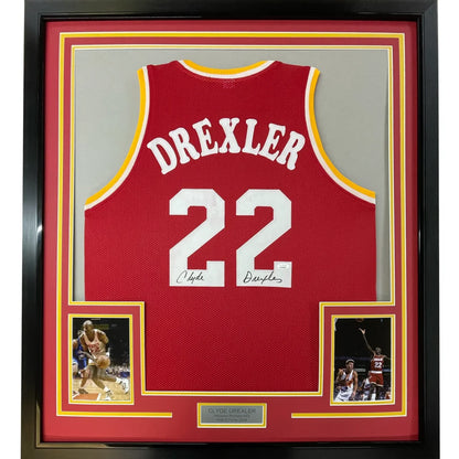 Framed autographed Clyde Drexler Houston red basketball jersey number 22