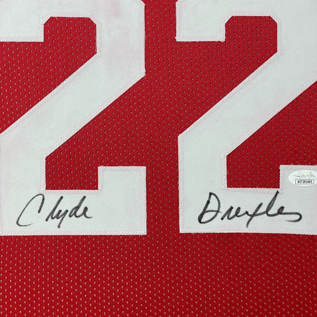 Framed autographed Clyde Drexler Houston red basketball jersey with number 22