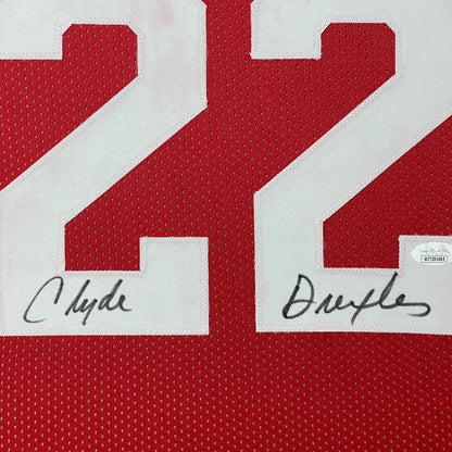 Framed autographed Clyde Drexler Houston red basketball jersey with number 22