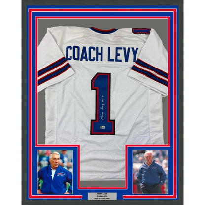 Framed Autographed Coach Marv Levy 35x39 HOF 01 Buffalo White Football Jersey Beckett BAS COA | Hall of Fame Sports Memorabilia | vintageantiquesgifts.com