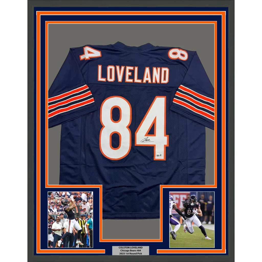 Navy blue and orange chicago bears jersey with the name ’loveland’ and number 84, featuring a signature below the number.