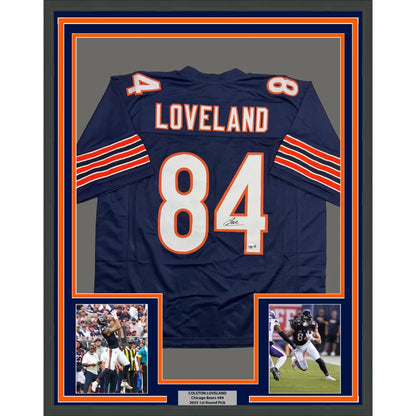 Navy blue and orange chicago bears jersey with the name ’loveland’ and number 84, featuring a signature below the number.