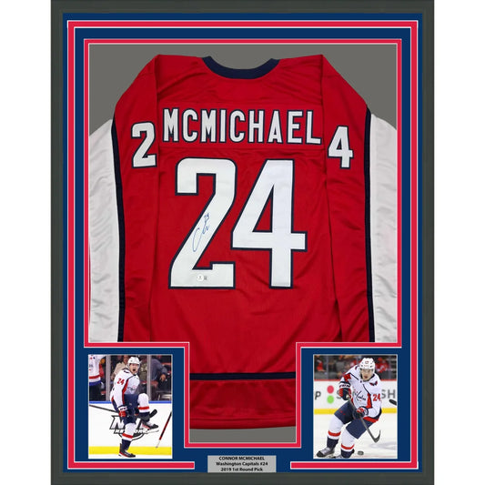 Framed Autographed Connor McMichael 35x39 Washington Red Hockey Jersey Beckett BAS COA | Hall of Fame Sports Memorabilia | vintageantiquesgifts.com
