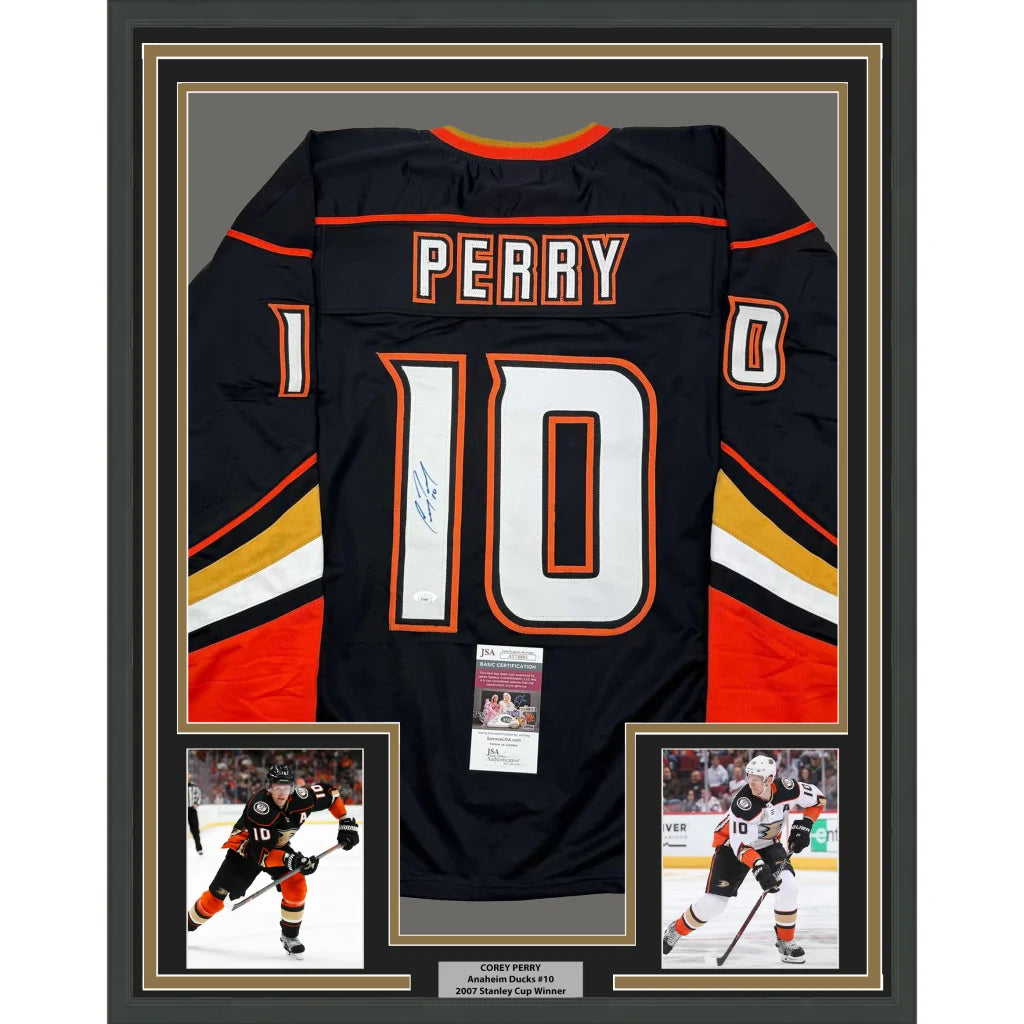 Framed autographed Corey Perry black Anaheim hockey jersey with Perry 10, JSA COA