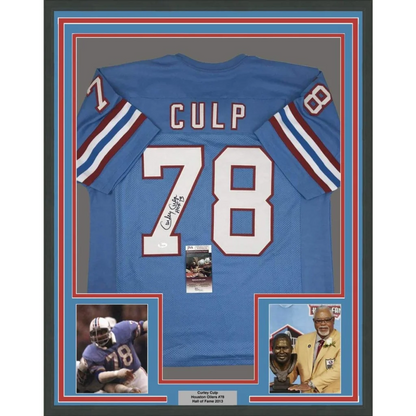 Back side of a blue Houston Oilers framed autographed Curley Culp jersey with white and red trim number 78