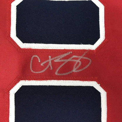 Autographed red Sox jersey with navy and white numbers in museum quality display