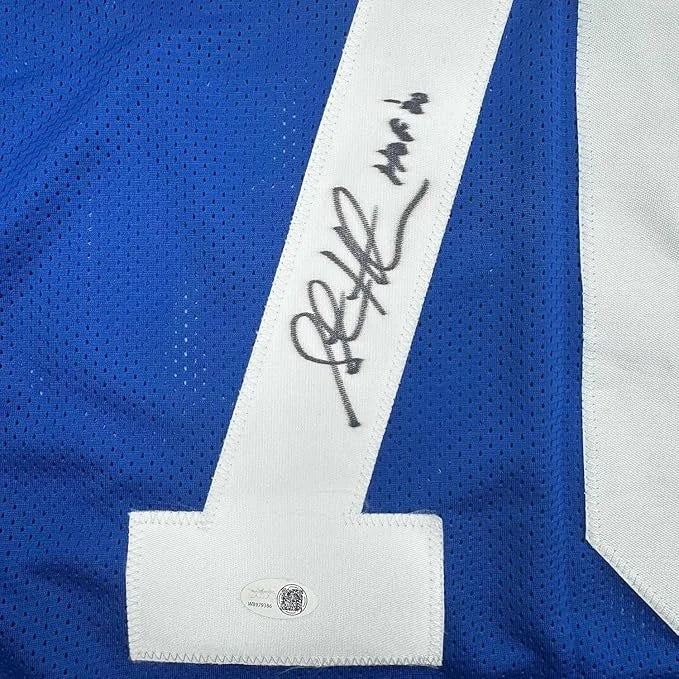 Framed autographed Curt Warner Seattle blue retro football jersey back with JSA sticker