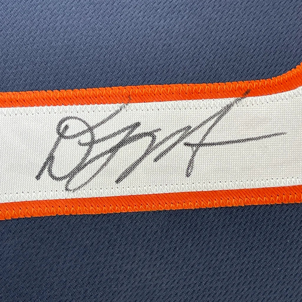 Autographed Chicago Bears Moore jersey with orange and white trim in a photos frame ready display