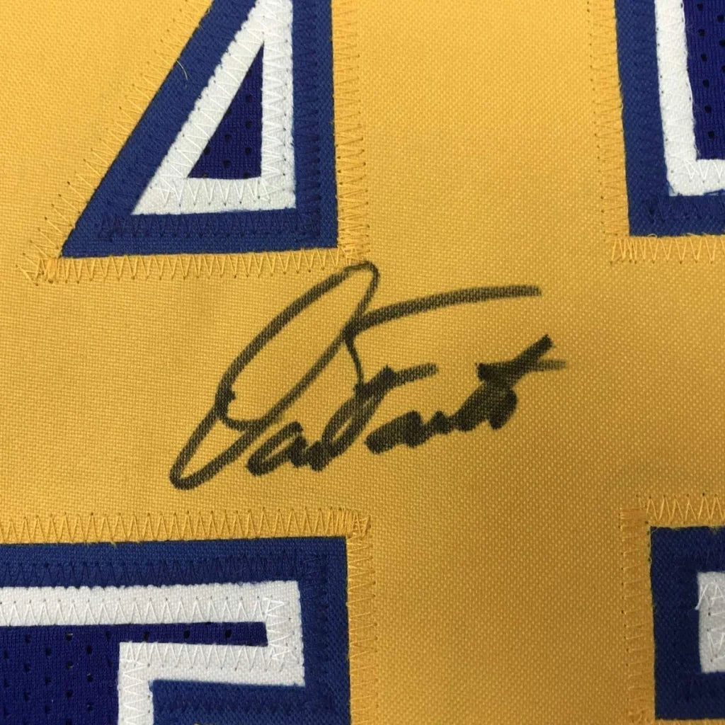 Black ink signature on a yellow and blue san diego royal blue football jersey framed autograph by dan fouts
