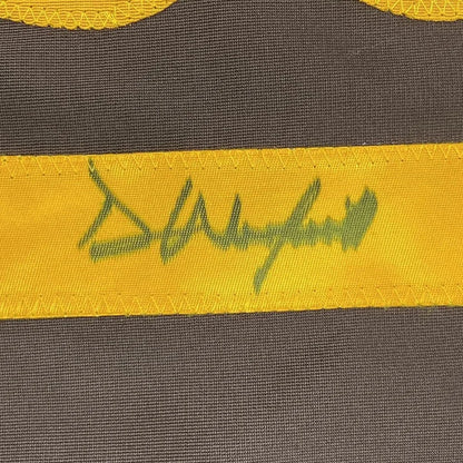 Framed autographed Dave Winfield yellow fabric band with green signature