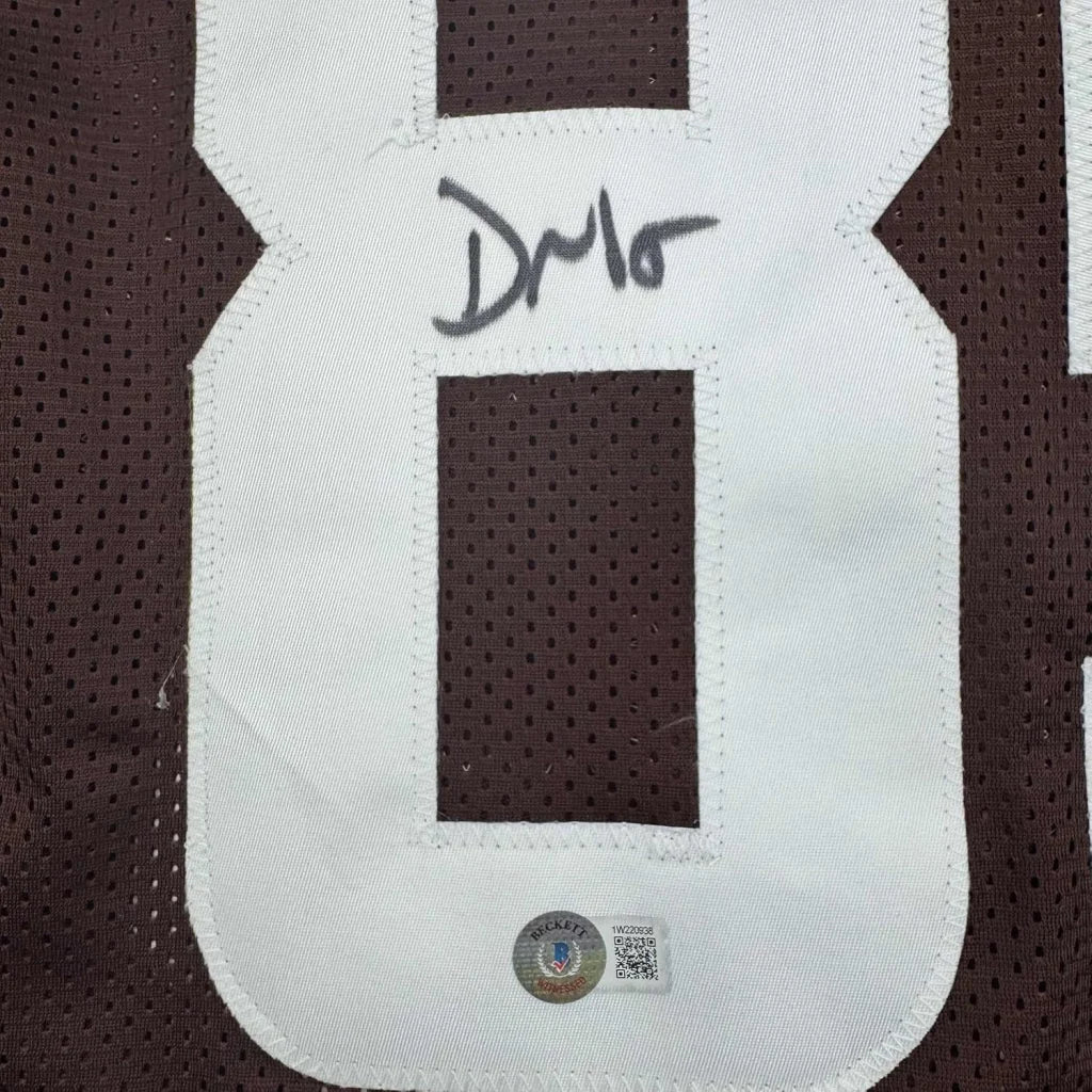Brown sports jersey with white 8 and black autograph, professionally framed David Njoku Beckett BAS