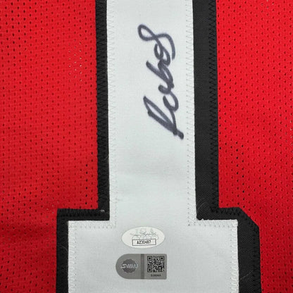 Red sports jersey with white number and autograph in a professionally framed Deebo Samuel display