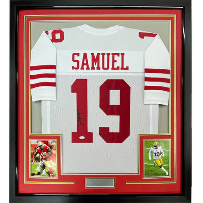Autographed Deebo Samuel 49ers jersey with player photos in a museum quality frame