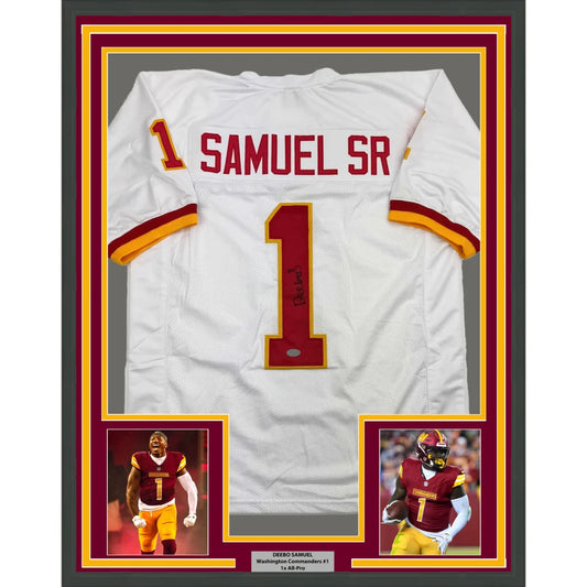 Framed white football jersey with player photos ready to display