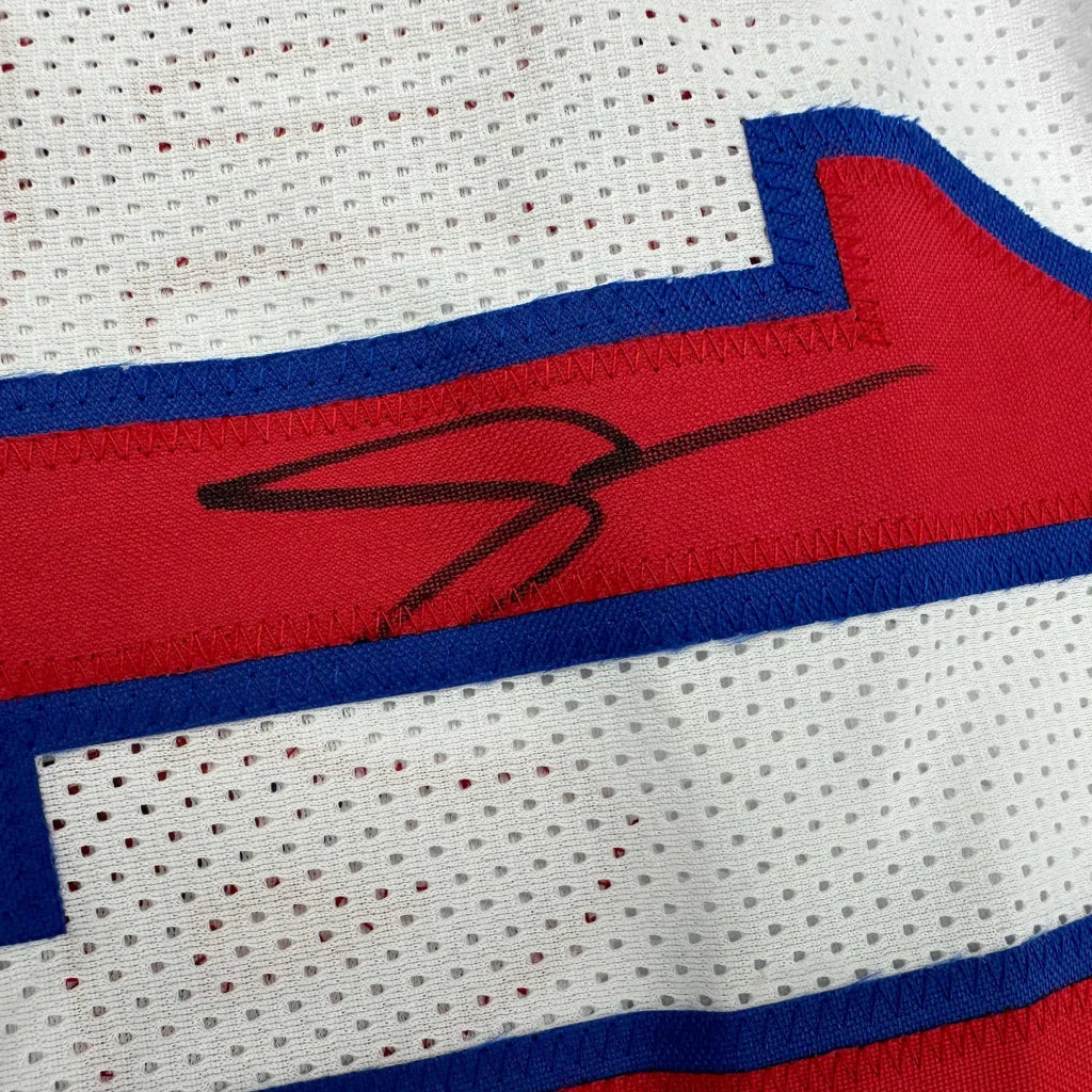 White and red DeMar DeRozan signed jersey with blue trim, perfect for your man cave