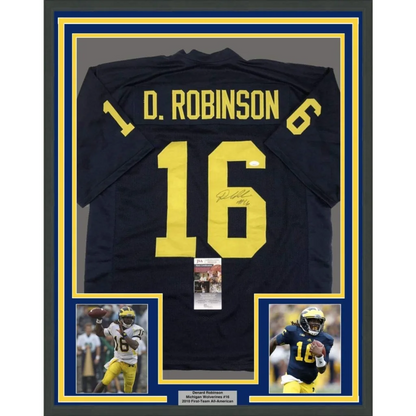 Framed autographed Denard Robinson Michigan Wolverines navy blue jersey with yellow lettering and JSA COA