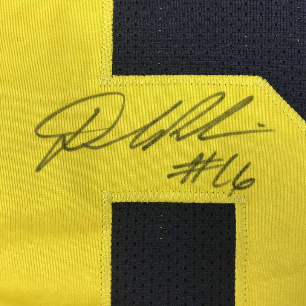 Framed autographed Denard Robinson Michigan jersey number 16 in yellow and navy blue with JSA COA
