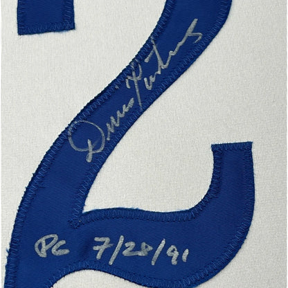 Framed autographed Dennis Martinez Montreal Expos jersey with blue number six patch