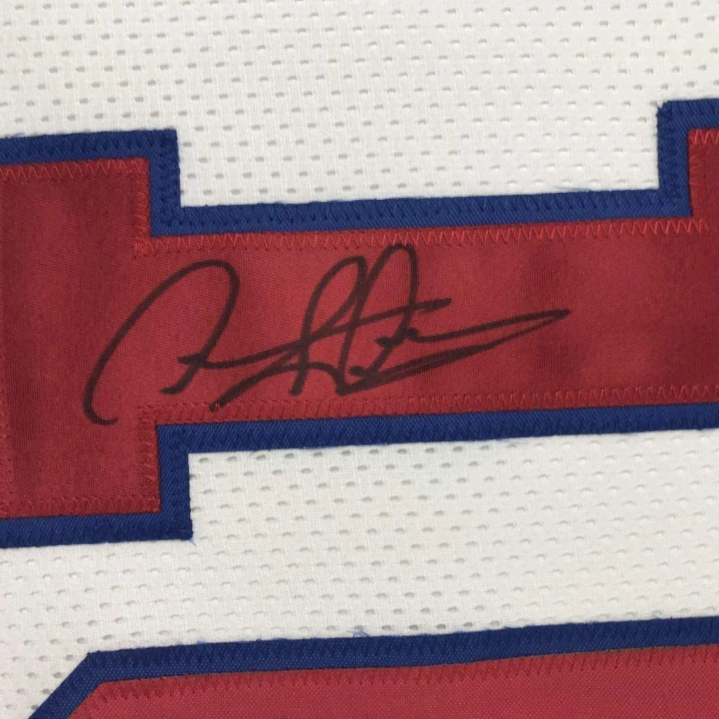 Dennis Rodman signed white jersey with red and blue trim perfect for your man cave