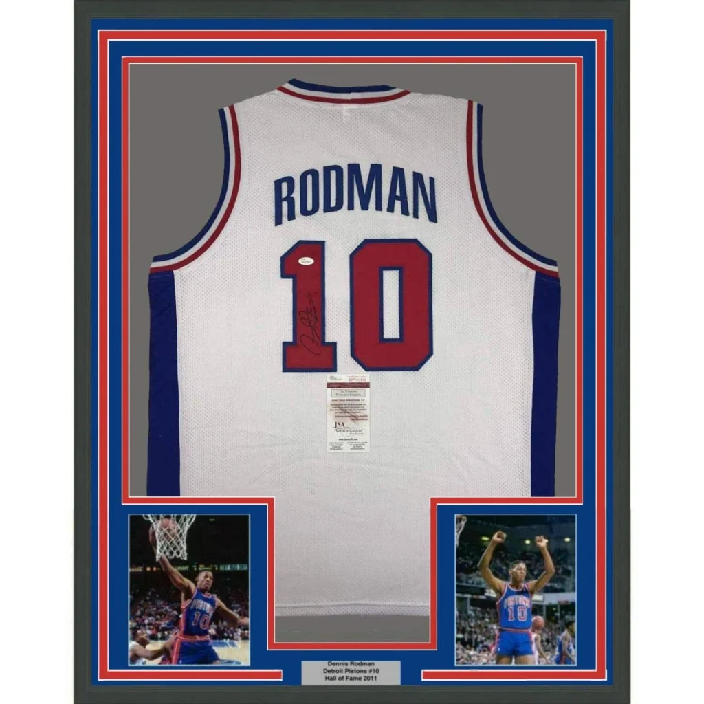 Framed Dennis Rodman Detroit Pistons #10 autographed jersey with action shots for your man cave