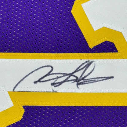 Framed autographed Dennis Rodman LA purple basketball jersey with gold mesh and white stripe, PSA/DNA COA