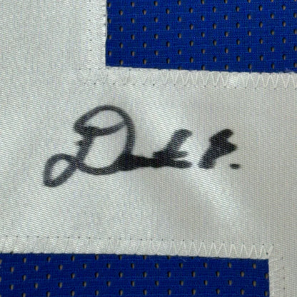 Framed autographed Deonte Banks New York Giants blue jersey with black ink signature